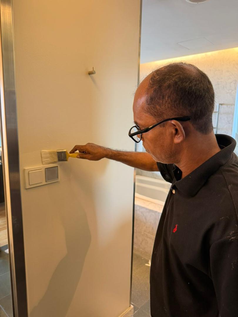 T&M technician performing building maintenance